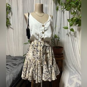 White and Snake Print romper with Buttons